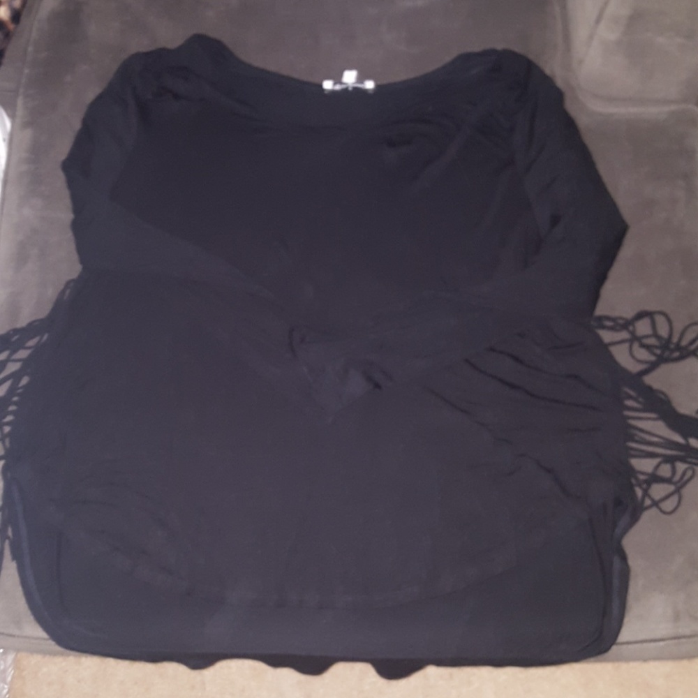 Black top with fringe sides
